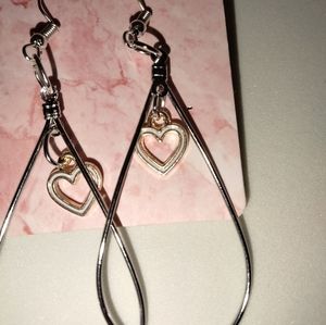 White hearts inside of sterling silver teardrops